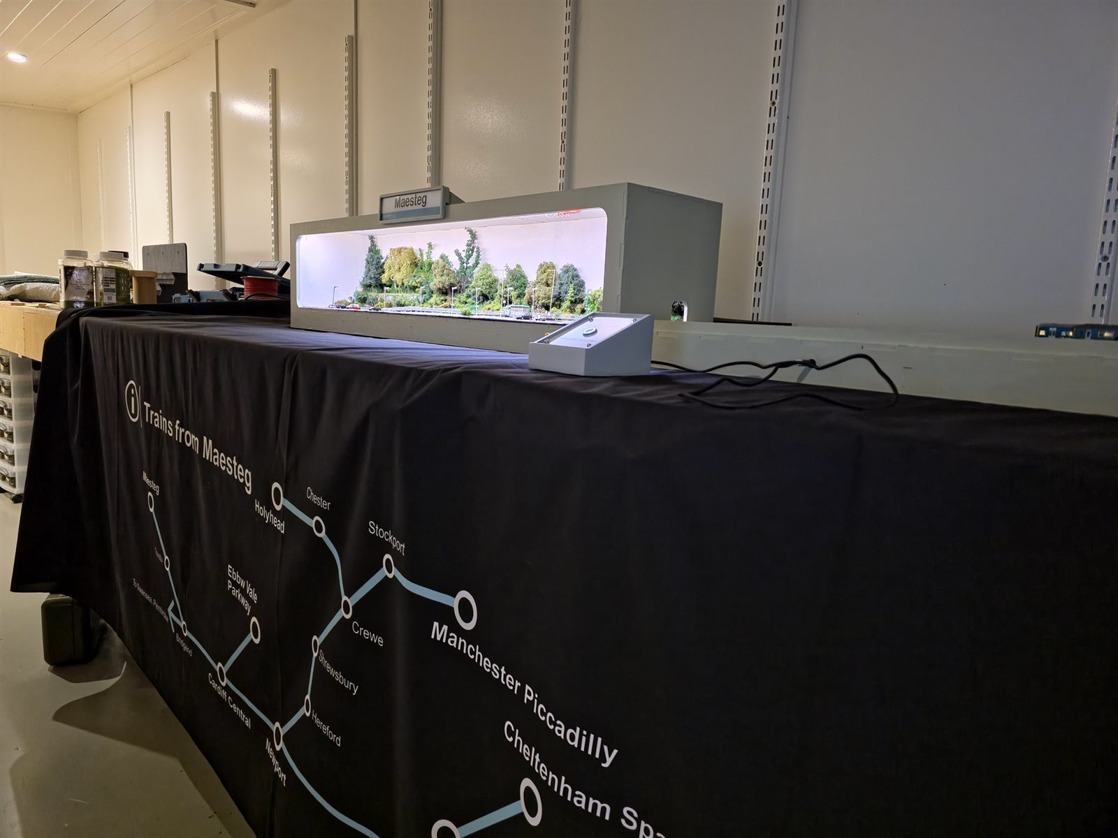 Angled view of Maesteg set up on its exhibition table with route map cloth and Time Warp button