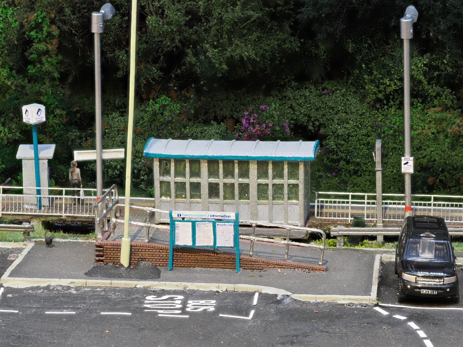 Maesteg station shelter, bilingual Gwybodaeth poster boards, access ramp and bus stop