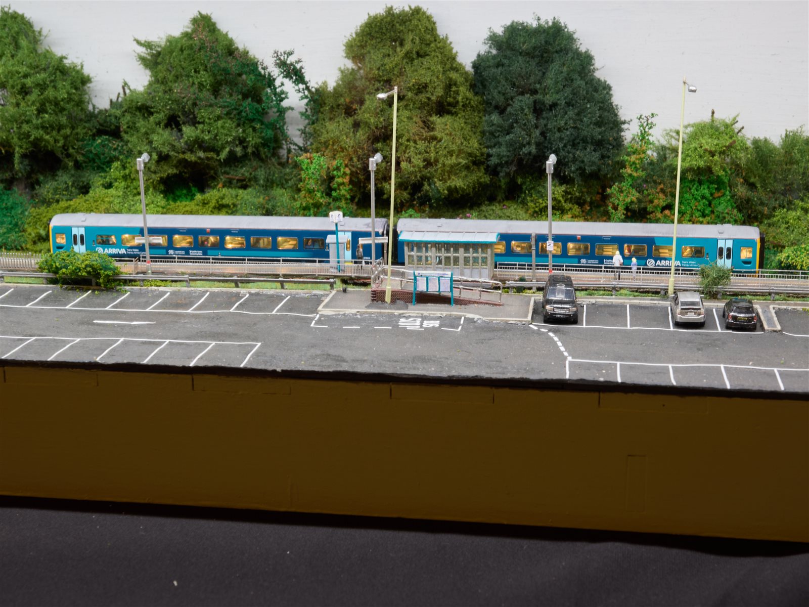 Wide view of a two-car DMU spanning the length of Maesteg station